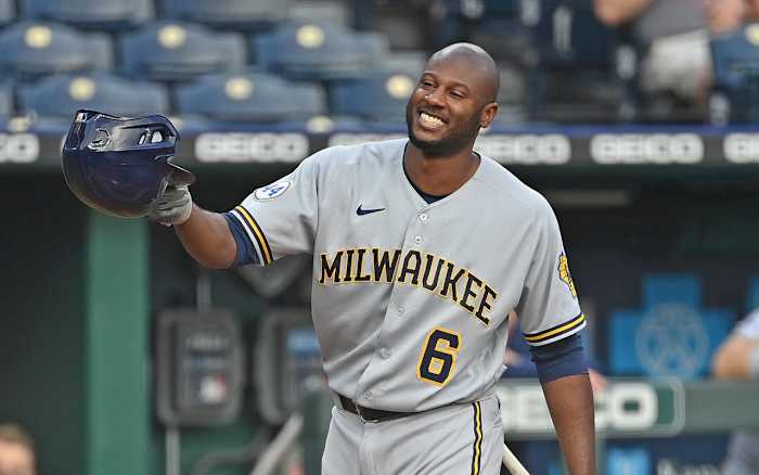 May 18, 2021; Kansas City, Missouri, USA; Milwaukee Brewers center fielder Lorenzo Cain (6) tips his cap to the Kansas City Royals fans during the first inning at Kauffman Stadium. Mandatory Credit: Peter Aiken-USA TODAY Sports